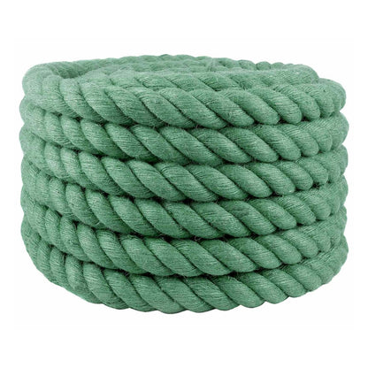 A thick green jute rope coiled neatly, showing its texture and colour