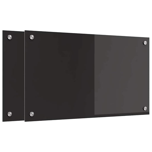 Two black tempered glass kitchen backsplashes shown from the side