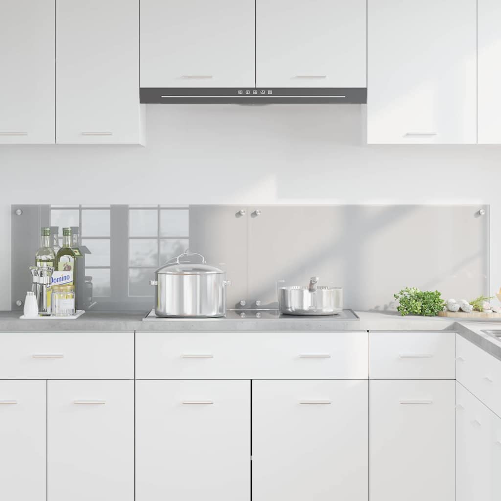 Light grey tempered glass kitchen backsplashes fitted behind a hob and sink