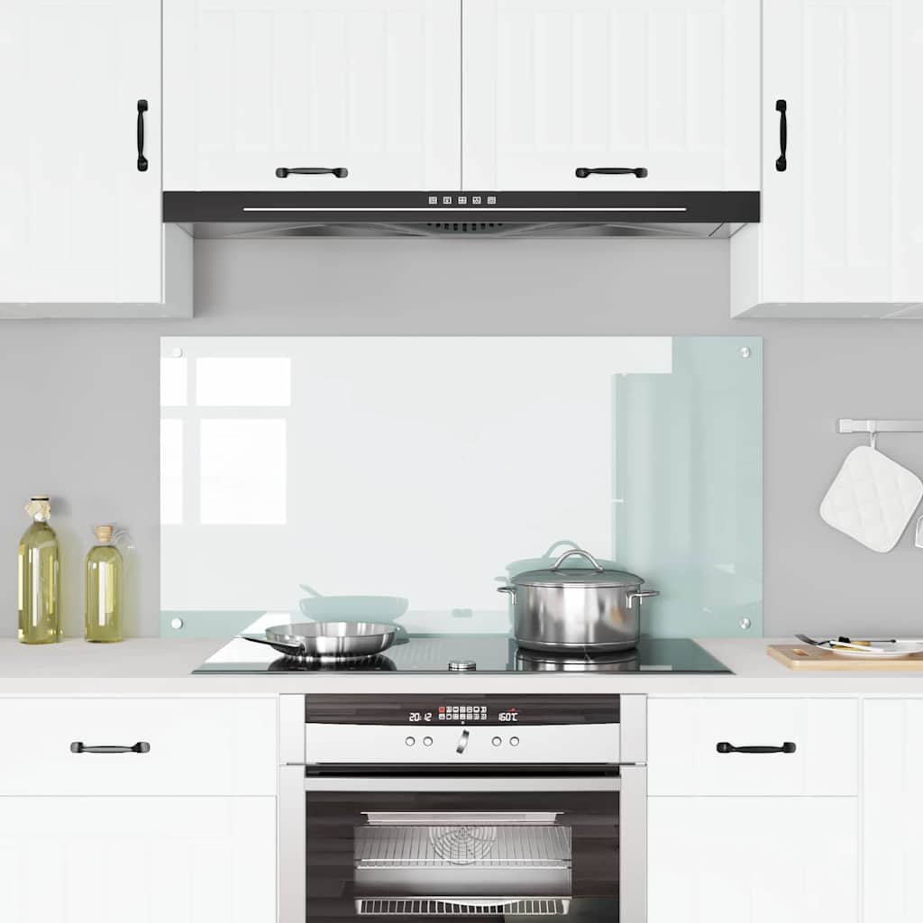 The white tempered glass kitchen backsplash installed above a cooker
