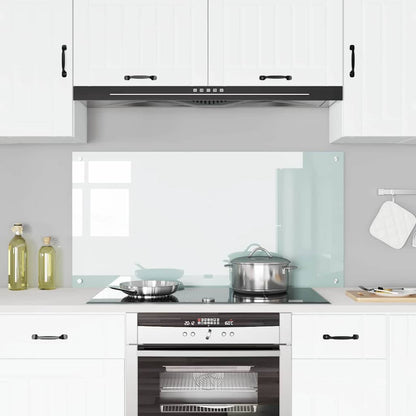 The white tempered glass kitchen backsplash installed above a cooker