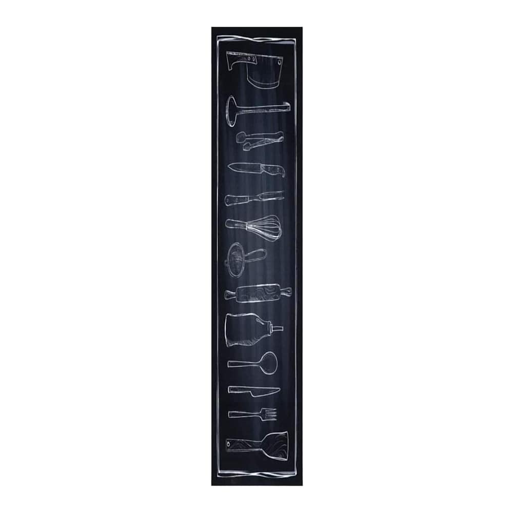 Close-up of the black kitchen rug showing a vertical line of chalk-style drawings of kitchen utensils