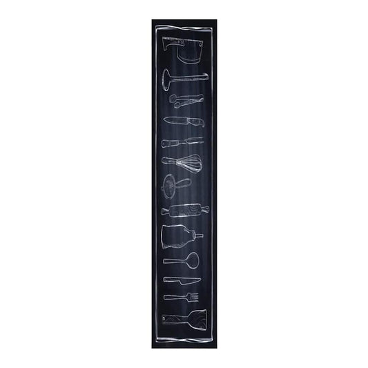 Close-up of the black kitchen rug showing a vertical line of chalk-style drawings of kitchen utensils