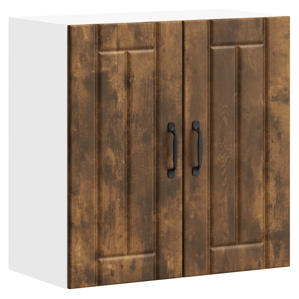 The kitchen wall cabinet with closed doors showing the wood grain and black handles