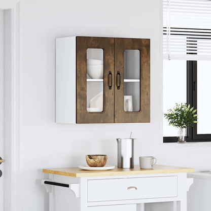 A kitchen wall cabinet with glass doors fitted above a kitchen island unit