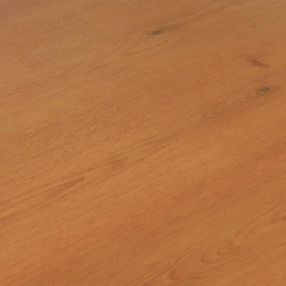 A section of the sandy beige laminate flooring showing the natural wood effect