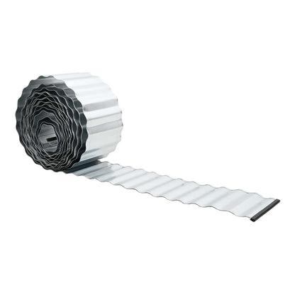 the lawn edging shown as a partially unrolled coil of corrugated metal strip
