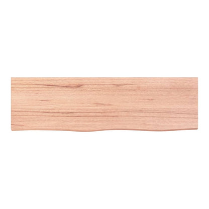 Close up of the light brown solid wood countertop showing its grain