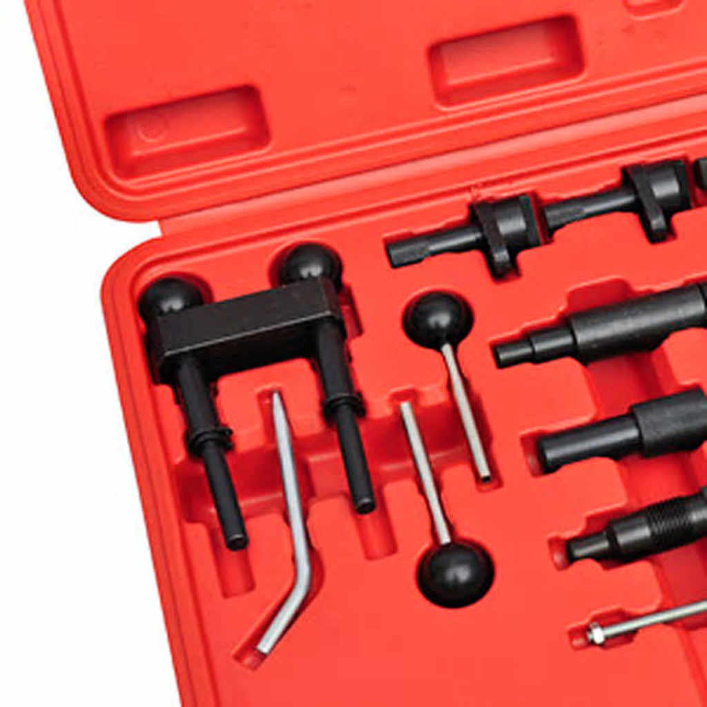 Close-up of several metal engine timing tools for diesel and gasoline engines