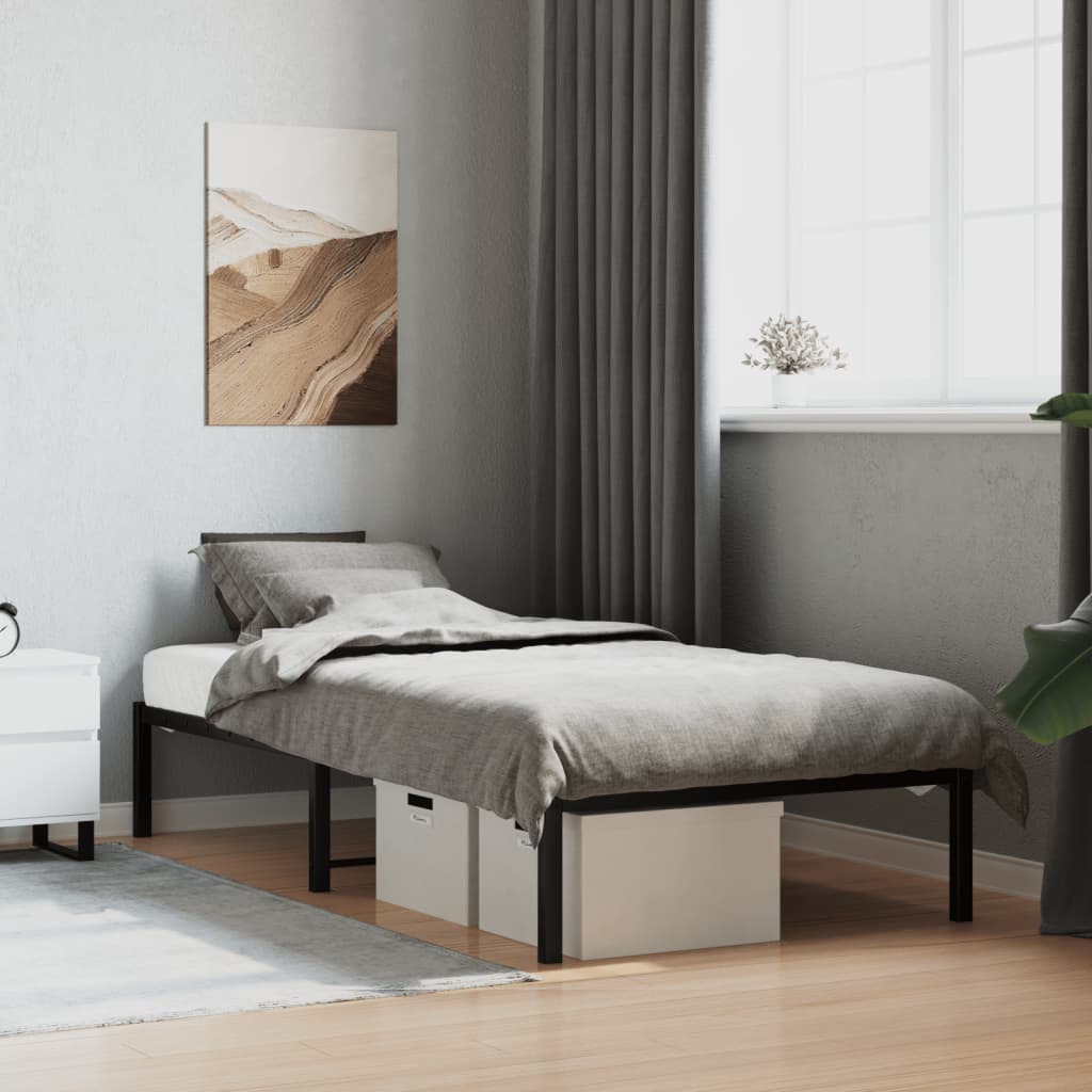 vidaXL Metal Bed Frame without Mattress Black set up in a modern bedroom with bedding and storage boxes