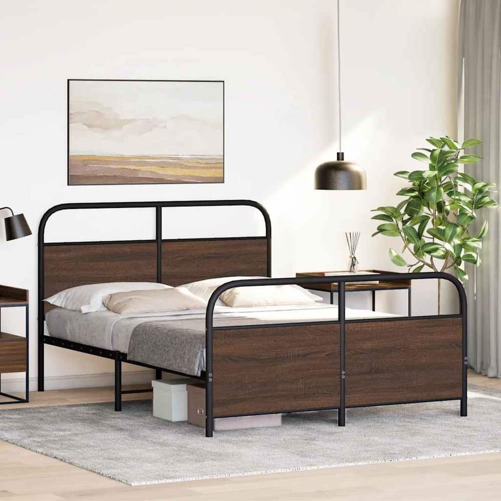 The brown oak metal bed frame is set up in a bedroom with a mattress and bedside table