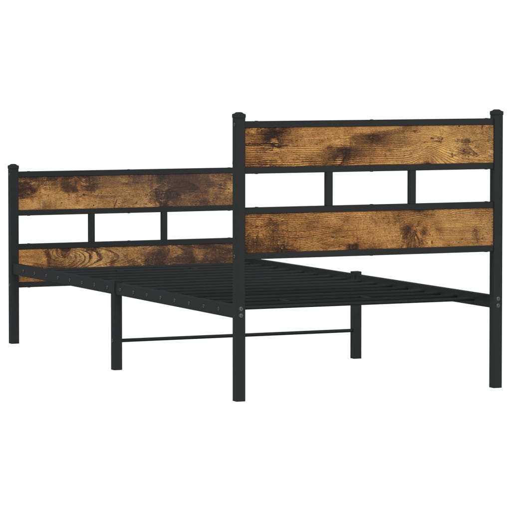 The smoked oak metal bed frame from a low angle, highlighting the legs and slatted base construction