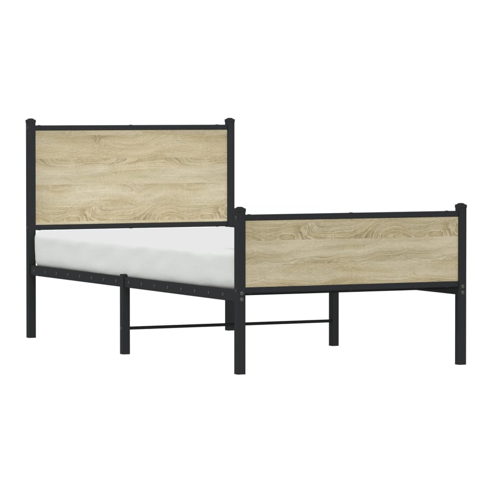 The metal bed frame with a Sonoma oak effect headboard and footboard