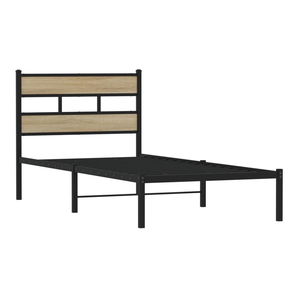 The metal bed frame has a slatted base and a headboard with a wood effect finish
