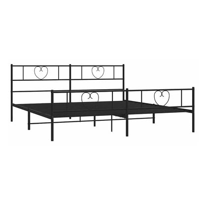 black metal bed frame without mattress with footboard and heart details