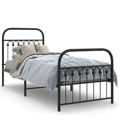 The black metal bed frame with a mattress and bedding shown with a white background