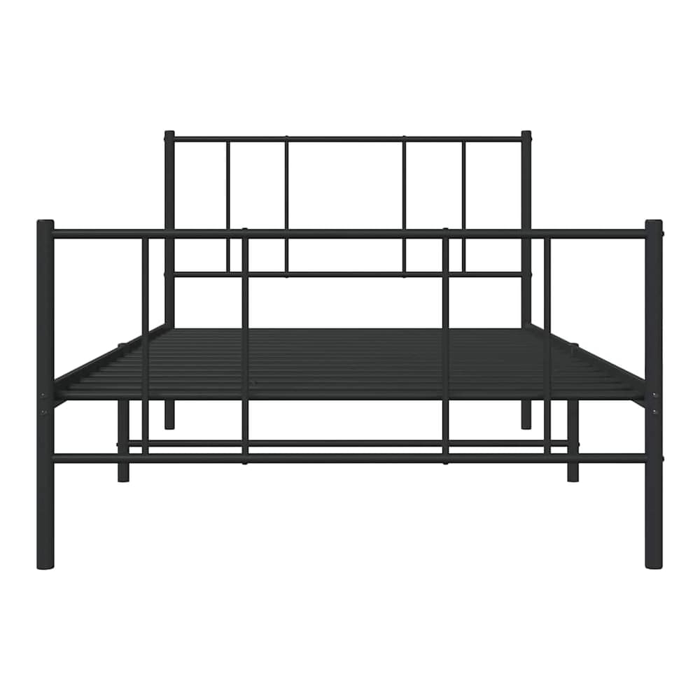 The black metal bed frame shown from the back with no mattress