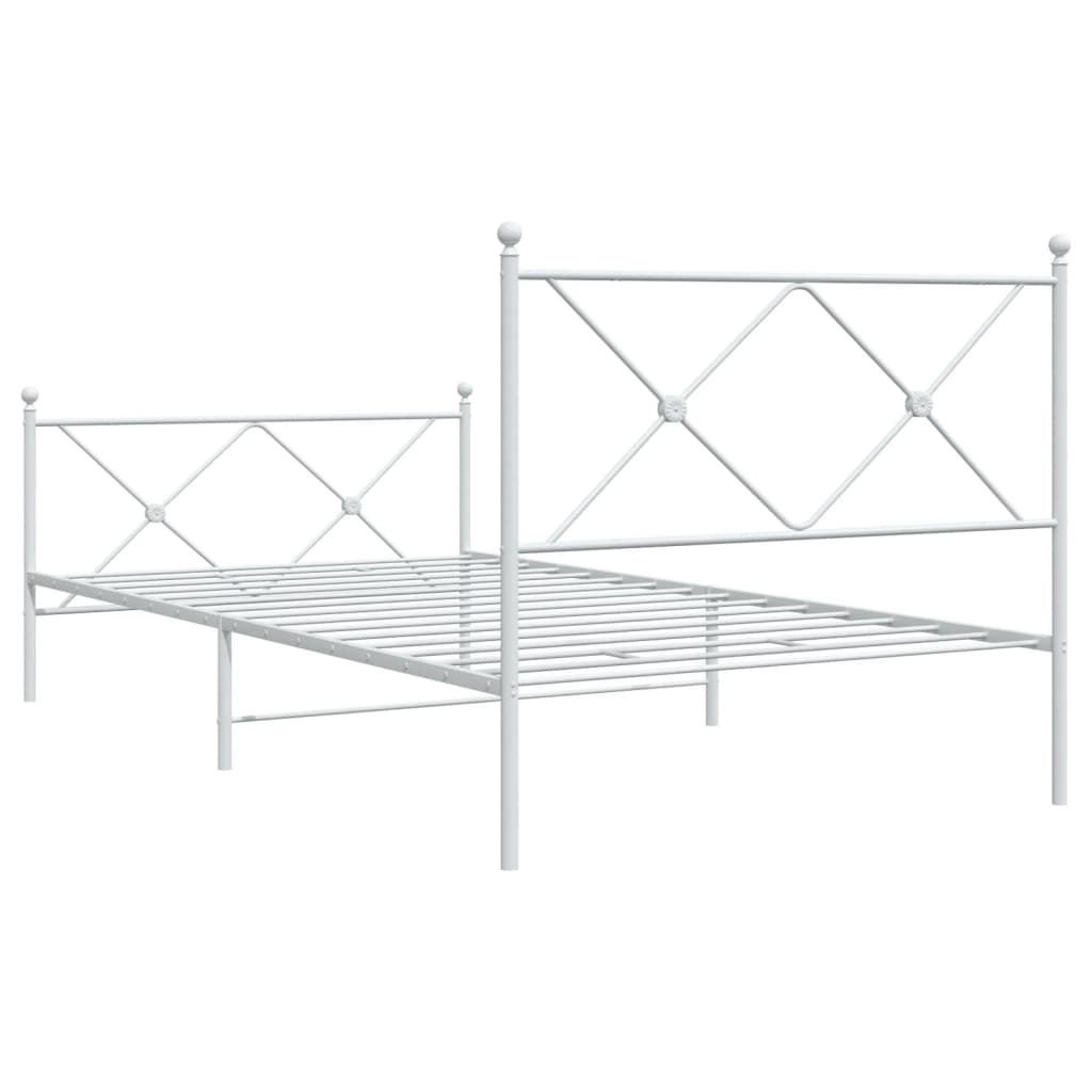 The metal bed frame showing the empty slatted base and white metal construction