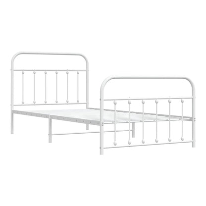 White metal bed frame without a mattress, showing the side and footboard