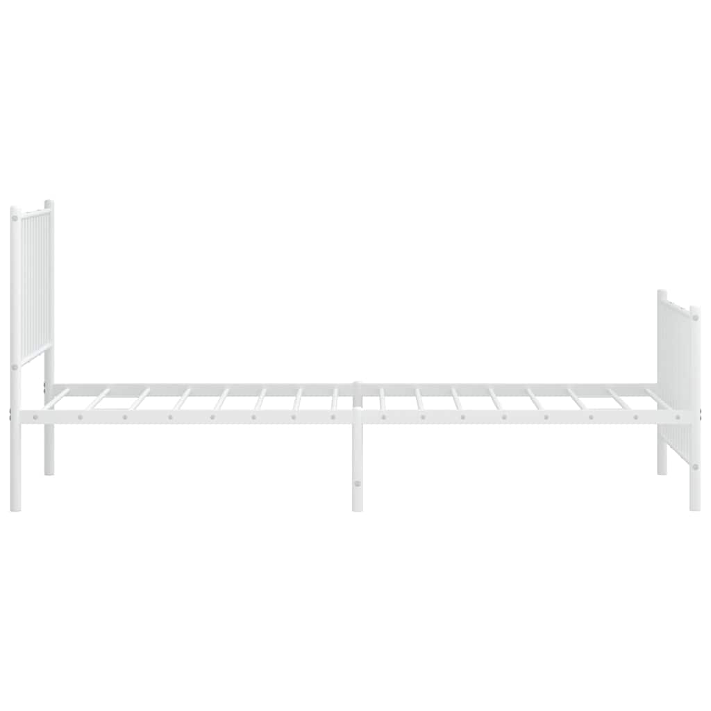 the white metal bed frame with a footboard shown from the side with no mattress