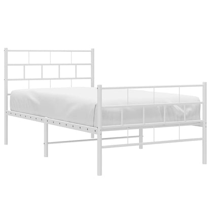 A white metal bed frame with a mattress and footboard on a plain white background