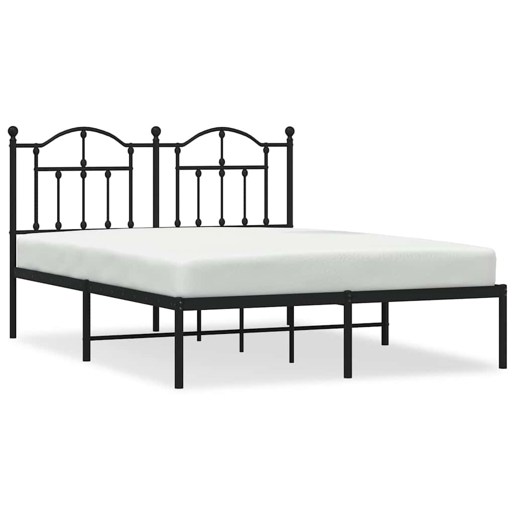 Black metal bed frame with a headboard and mattress