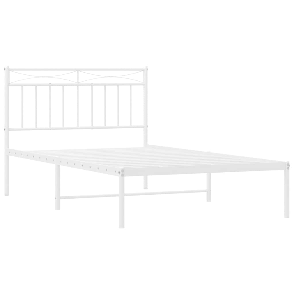 A white metal bed frame with a headboard