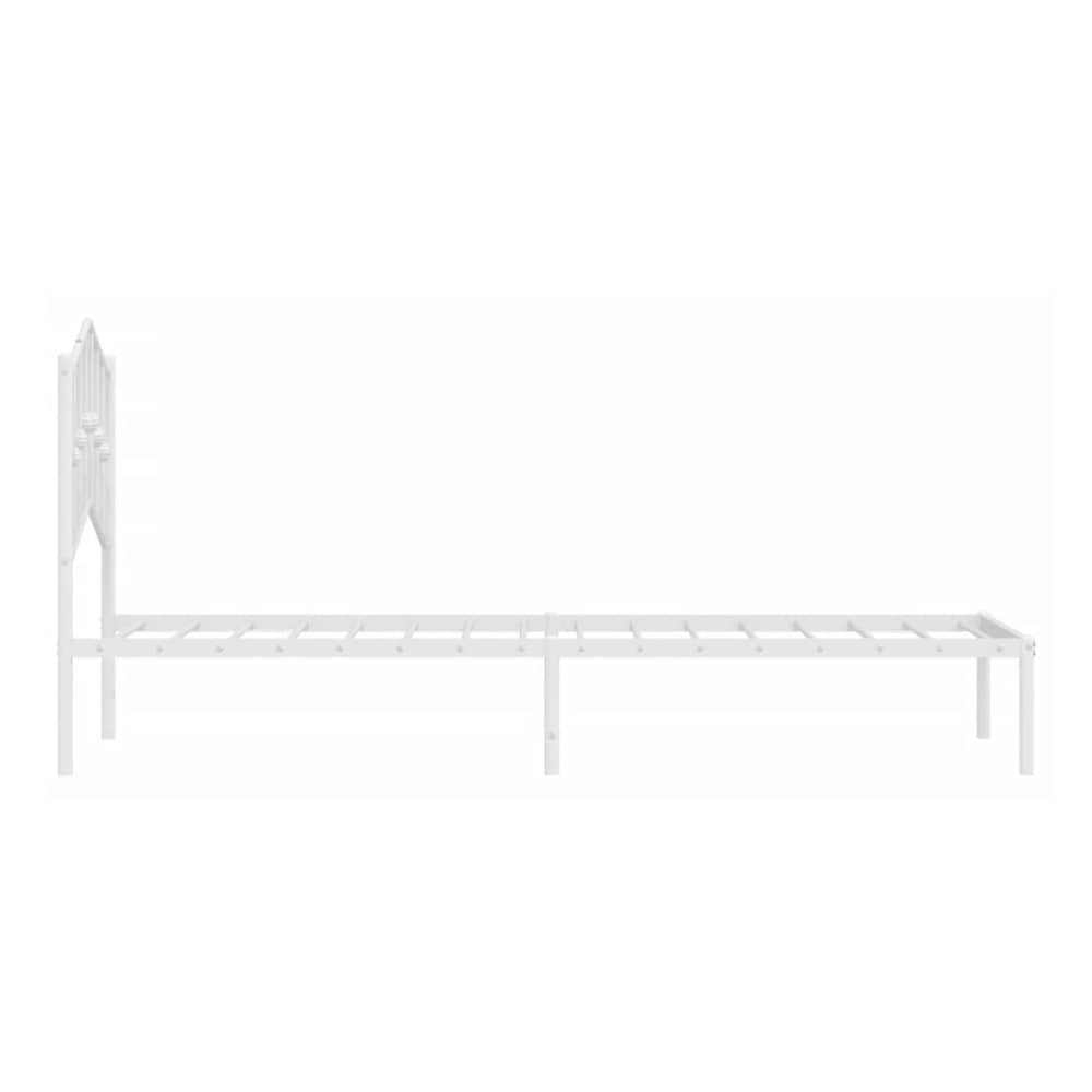white metal bed frame with a decorative headboard viewed from the side