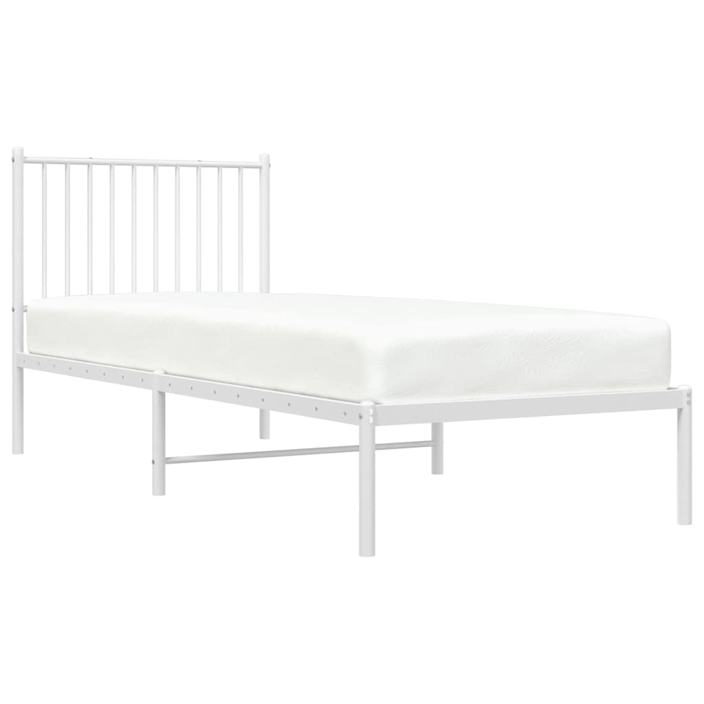 The metal bed frame viewed from a high angle showing the white finish and structure