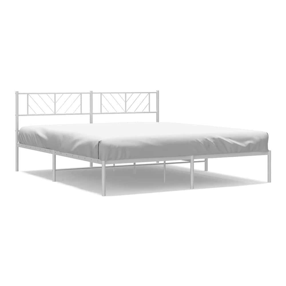 The white metal bed frame without a mattress shown on a plain background
