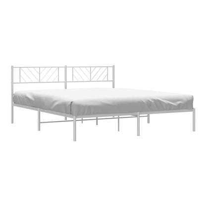 A white metal bed frame without mattress and headboard