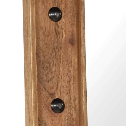 Detail of the wooden frame and fixing points on the mirror