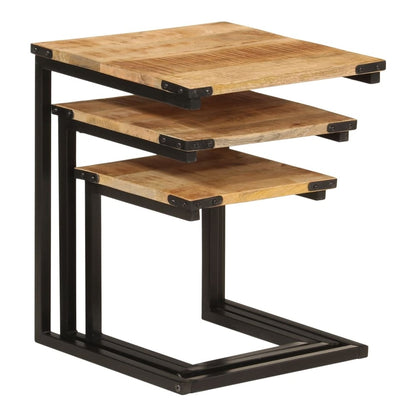 three wooden tables with black metal frames, one table tucked under another