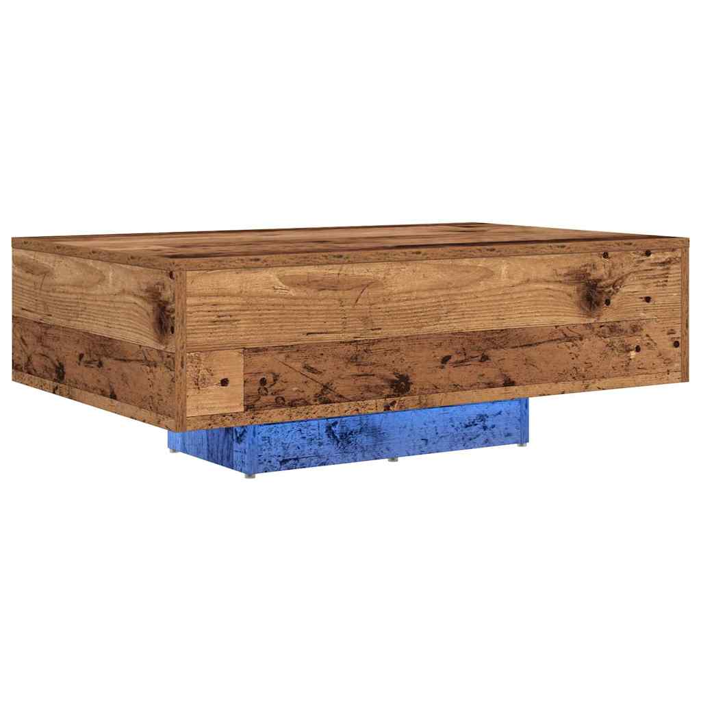The engineered wood coffee table with blue LED lighting underneath, viewed from the side