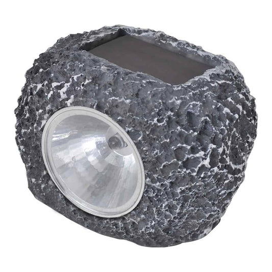 The solar spotlight showing the textured grey stone effect surface and the circular light lens