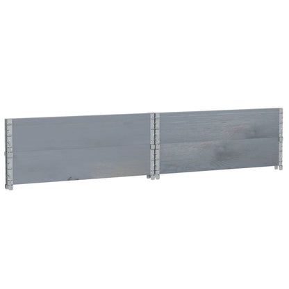 Two grey solid wood pine pallet collars joined together