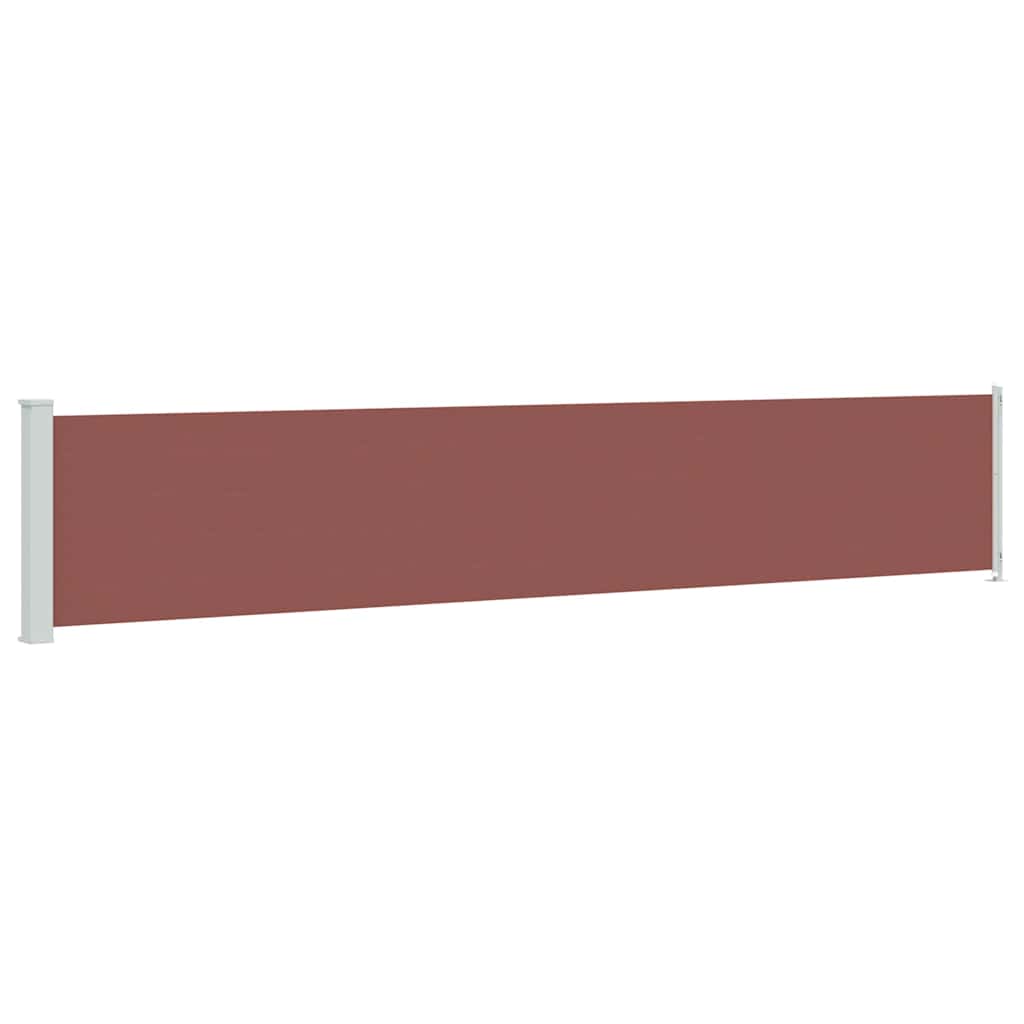 The brown patio awning extended fully, showing its width and the white support posts