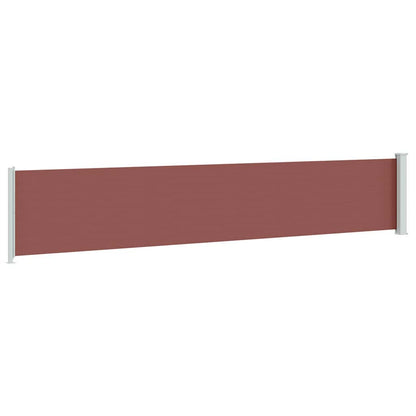 The brown patio awning extended between two white posts on a terrace