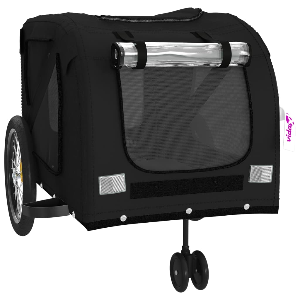 Close-up of the front mesh window and wheels of the black pet bike trailer