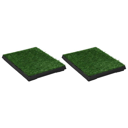 Two pet toilet training pads with artificial grass tops