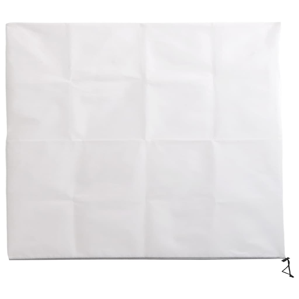 the protective garden cover laid out flat showing a square white fabric sheet