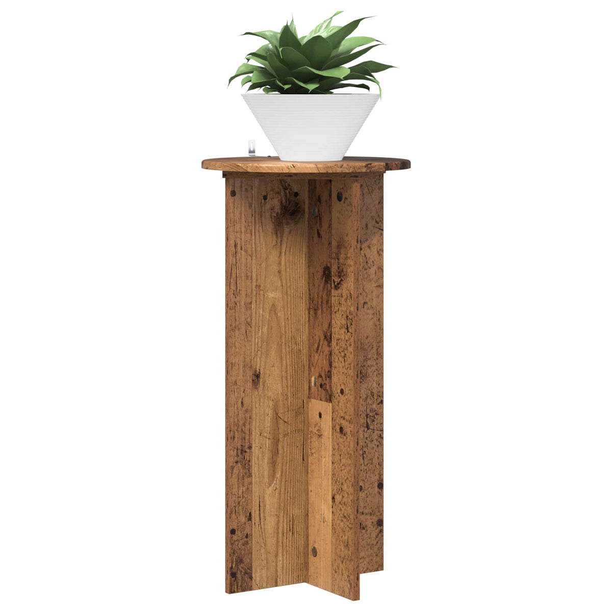 The plant stand with a white pot and green plant placed on the circular top surface