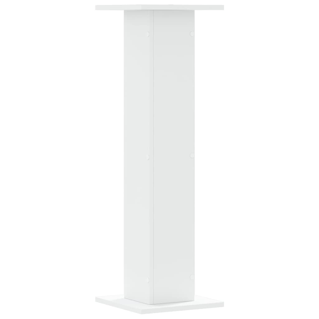 A single white plant stand from a slightly elevated angle