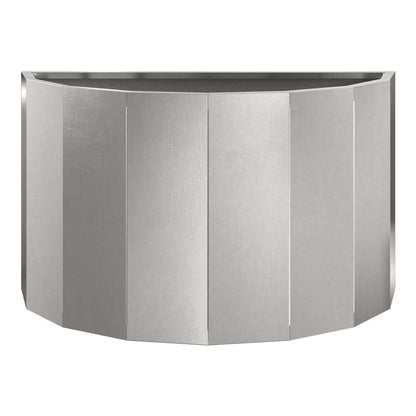 Close-up of the silver planter's metallic surface and vertical panels