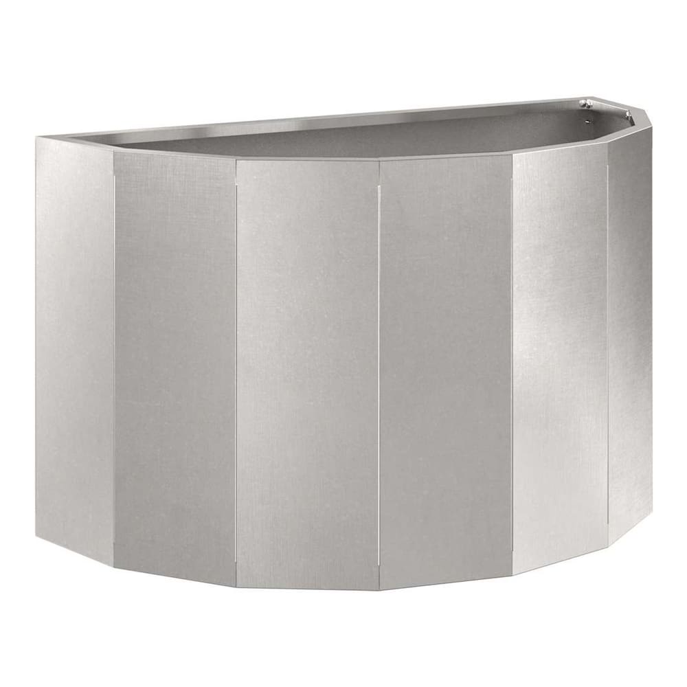 The silver stainless steel planter shown from a side angle with plants inside
