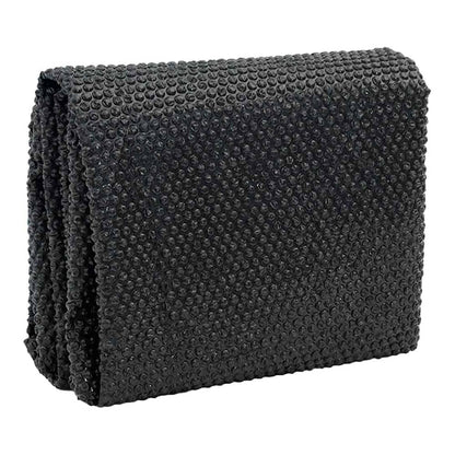 Folded black solar pool cover showing its bubble texture