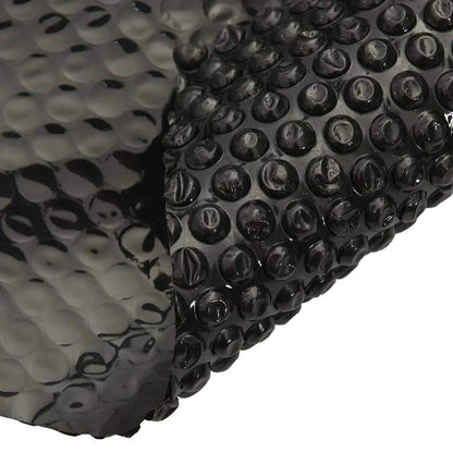 Close up of the black pool cover showing the bubble texture