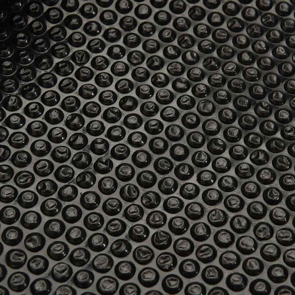 Detailed view of the bubble texture on the black pool cover