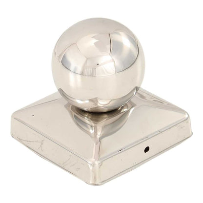 A single stainless steel post cap with a globe top, showing its shiny surface