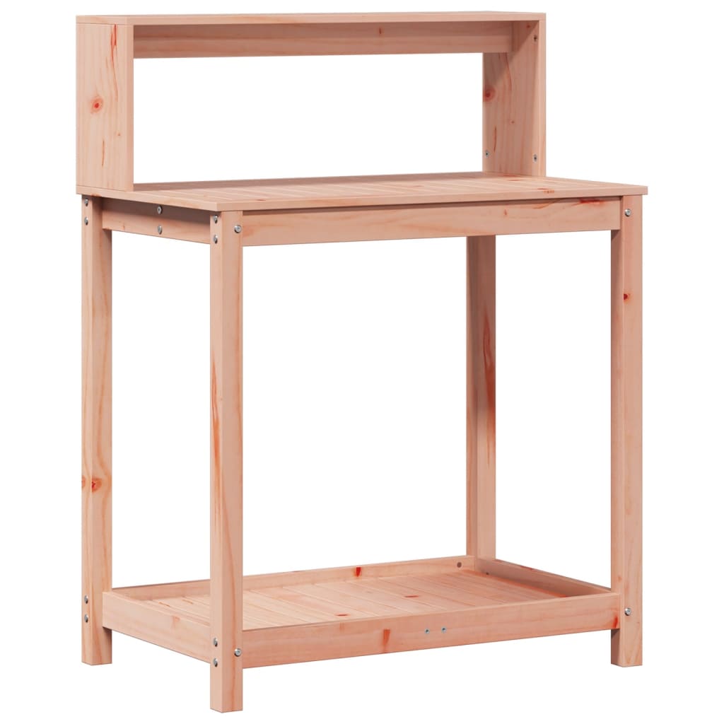 A solid wood potting table with shelves, shown outdoors against a wooden wall